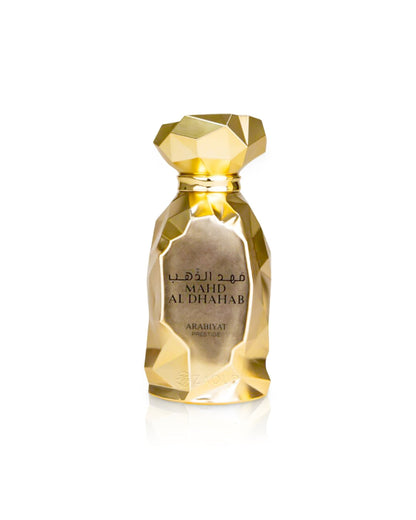 Flacone del profumo Arabiyat Prestige Mahd Al Dhahab Eau de Parfum 100ml unisex su sfondo bianco