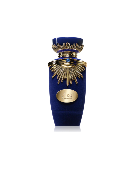 Dettaglio del lussuoso flacone in velluto blu del profumo Lattafa Emaan, sormontato da una maestosa scultura dorata a raggiera sul colletto e tappo blu